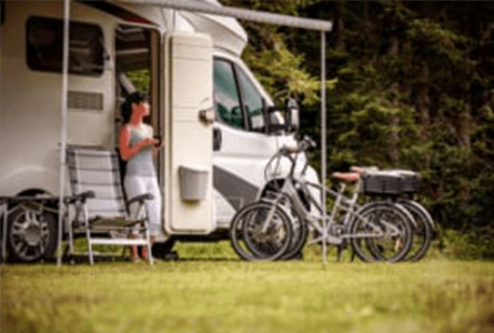 RV camper with bicycles.
