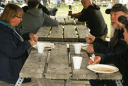 Group dining at picnic tables.