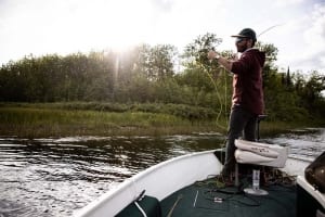 Photo of a Man Fishing on Elk Lake, a Northern Ontario Tourism Staple.